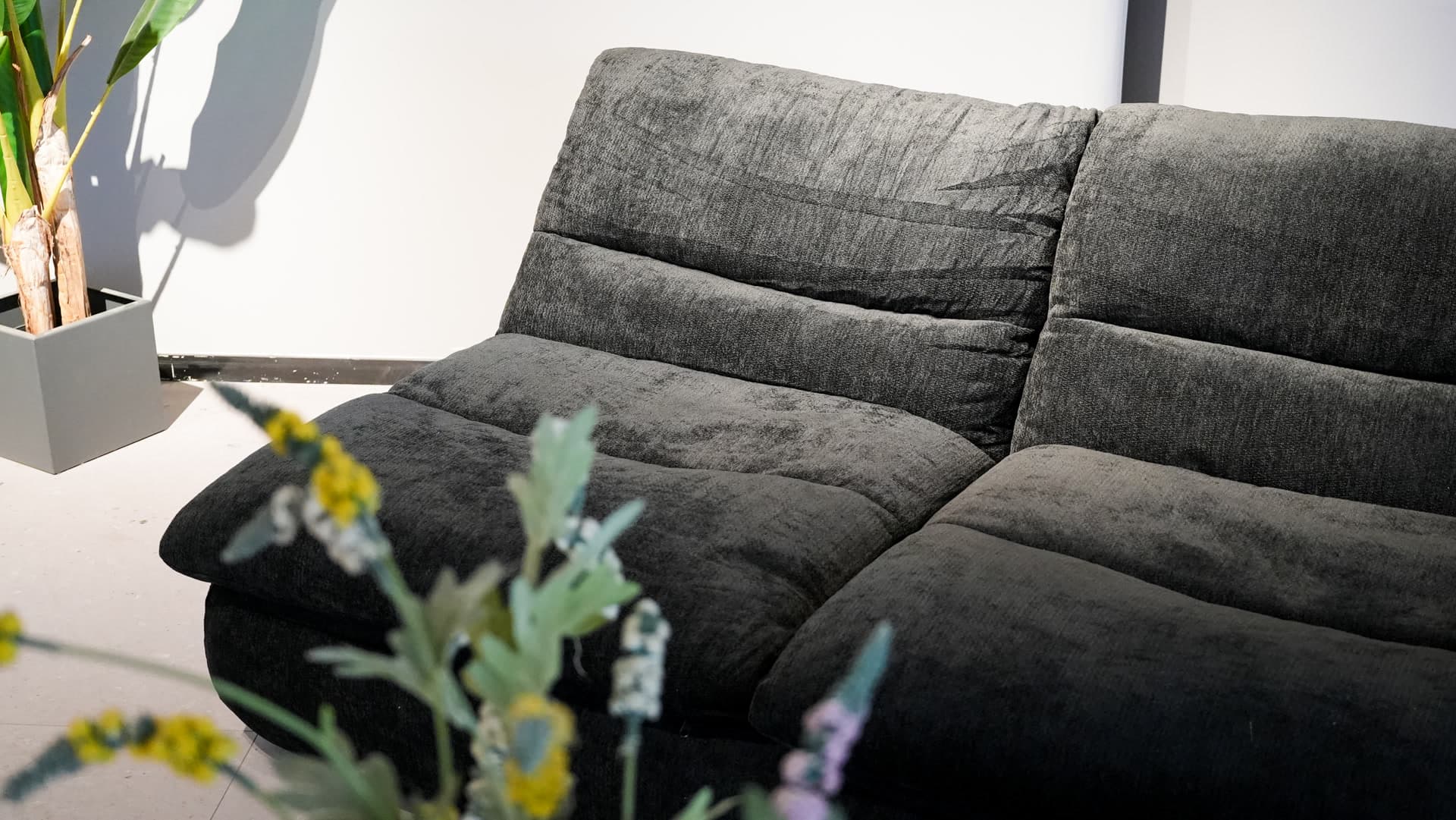 The Wombat Black - Angle view - Compressed sofa that fits in your car