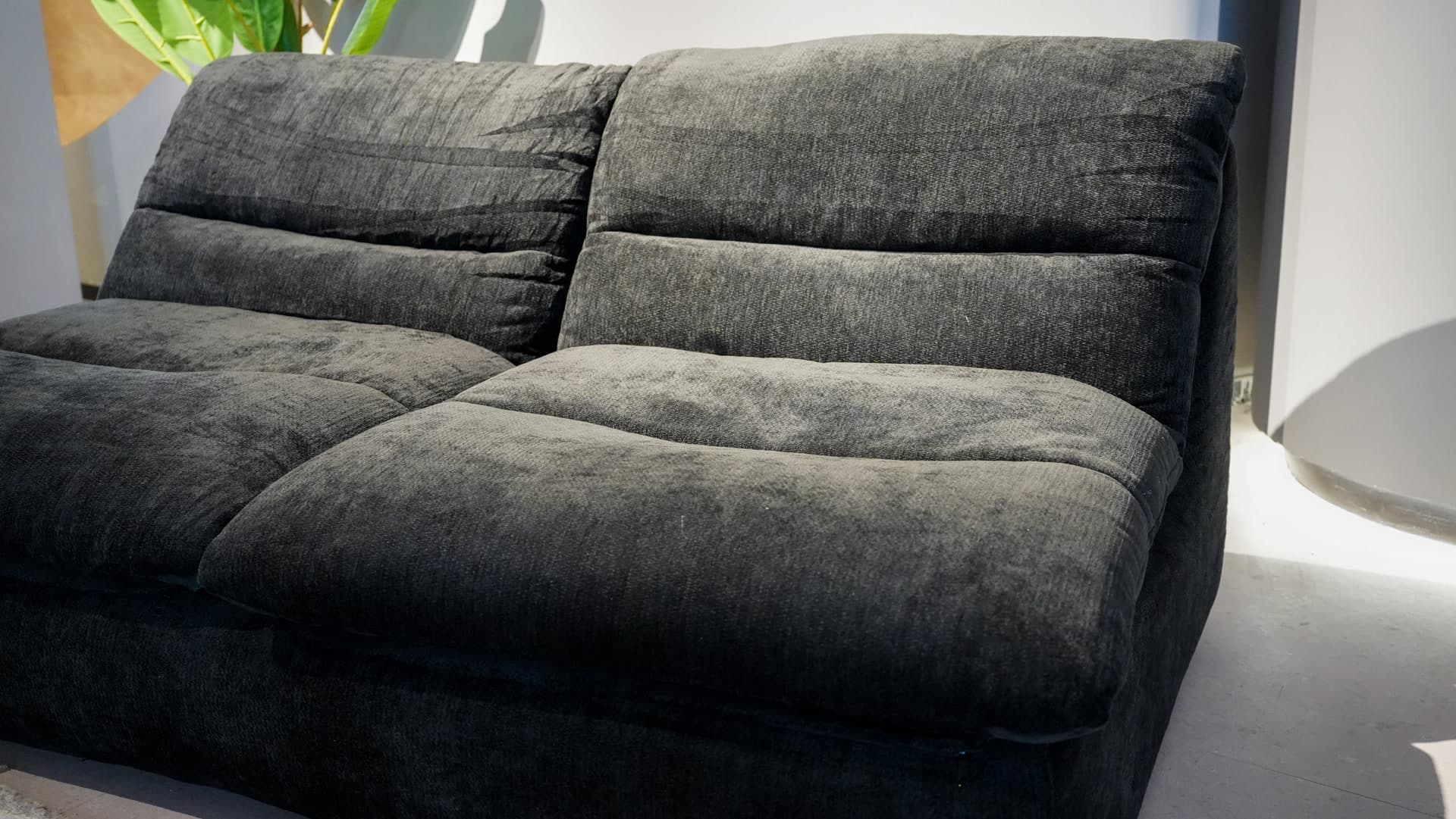 The Wombat Black - Side view - Compressed sofa that fits in your car