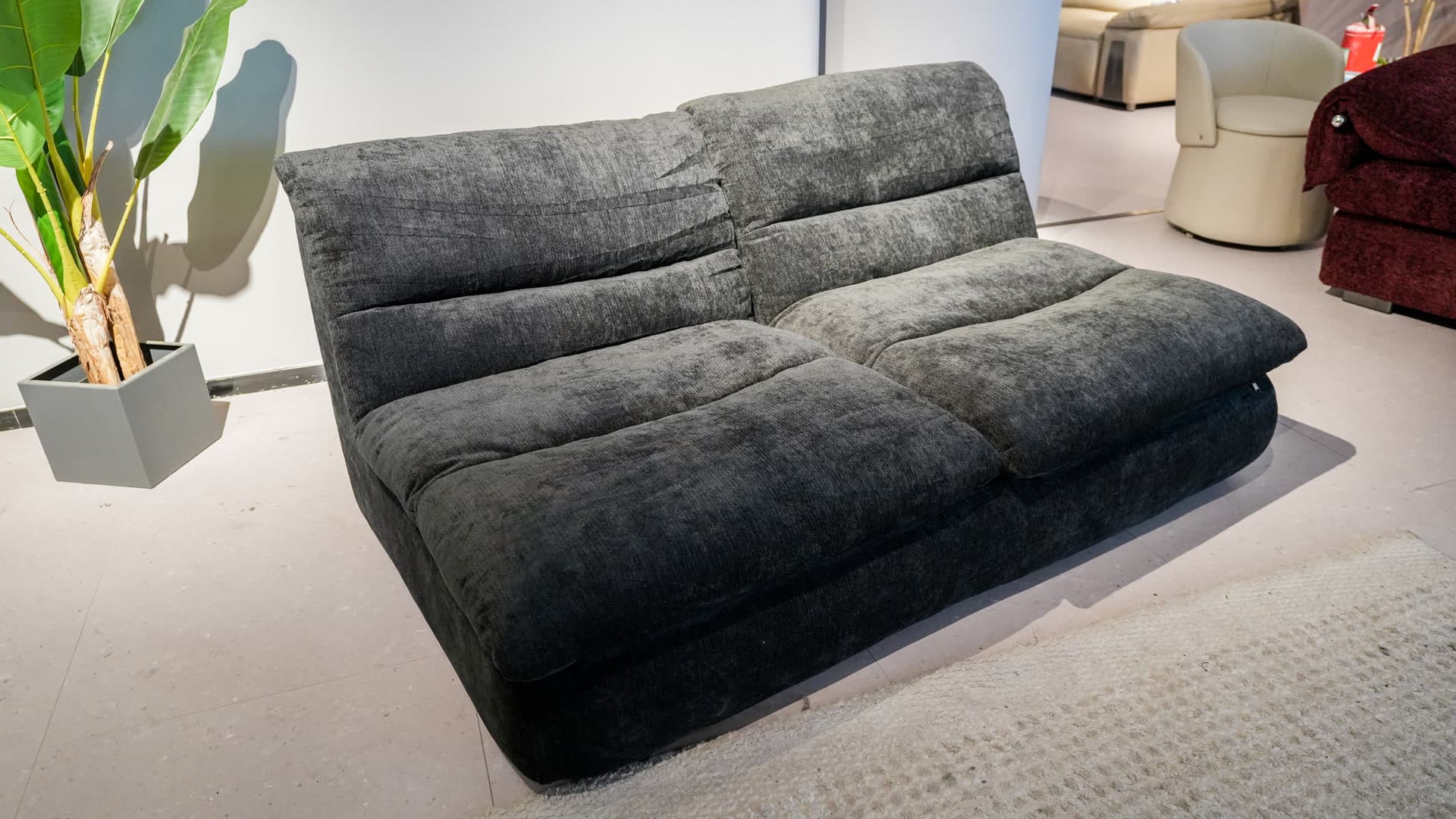 The Wombat Black - Close-up - Compressed sofa that fits in your car