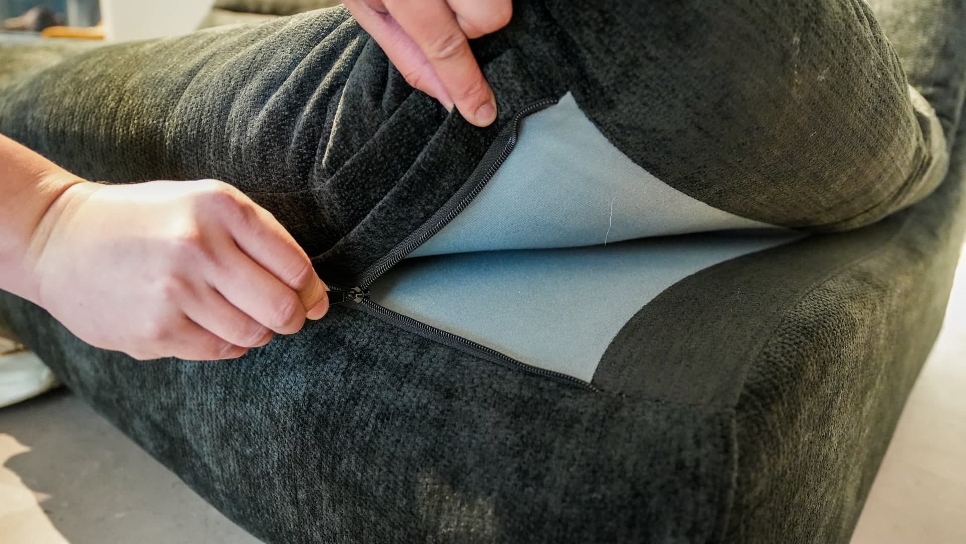 The Wombat Black - Lifestyle shot - Compressed sofa that fits in your car