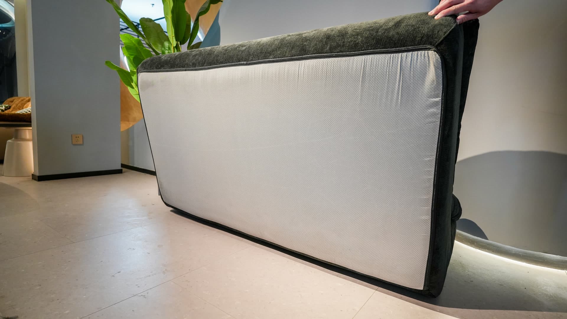 The Wombat Black - In-room view - Compressed sofa that fits in your car